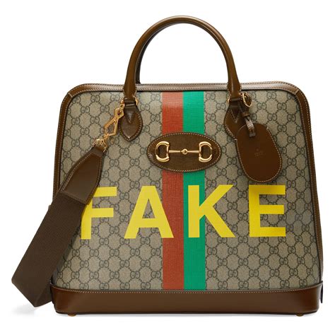 how to tell if gucci fake duffle|gucci handbags false.